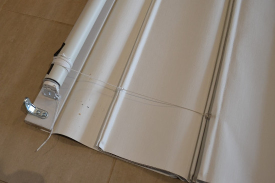 Roman blind cords wrap around motorized tube Roman blind cords wrap around motorized tube